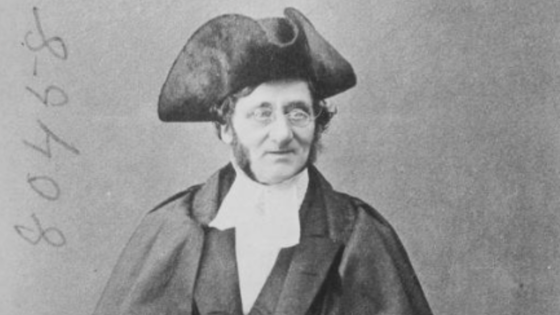 19th Century Black-and-White Photograph of a Man in a Hat and Glasses